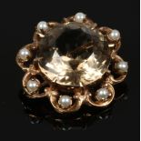 A 9ct gold citrine and pearl brooch.