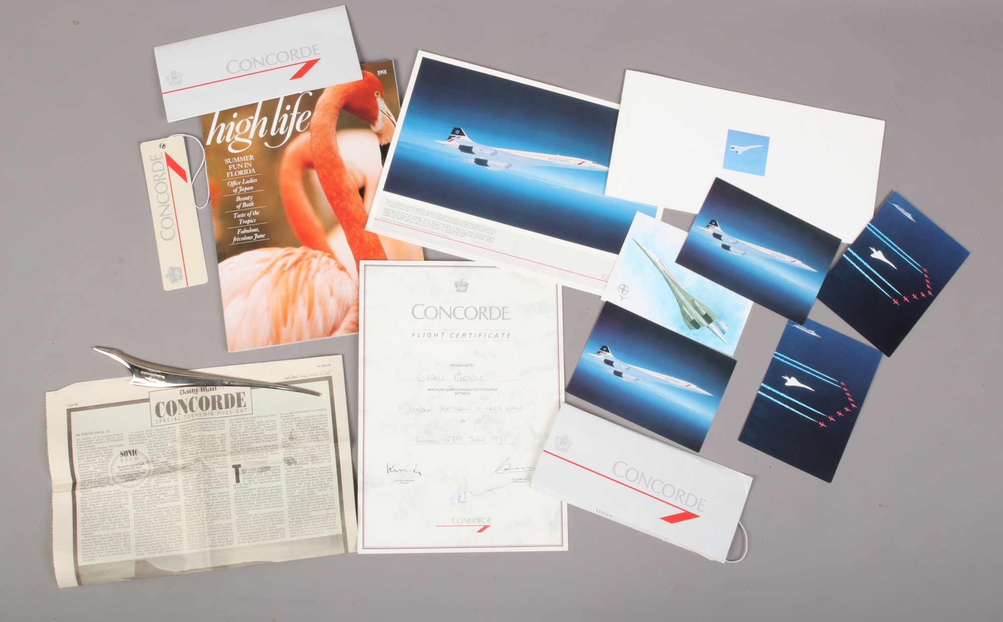 A wallet of Concorde and Vulcan Bomber memorabilia pertaining to the formation flight of the