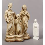 An early 20th century continental chalk statue group of The Holy Family and another figure.