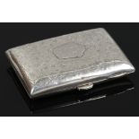 A silver cigarette case with chased decoration assayed Birmingham 1902, William H Hayes makers
