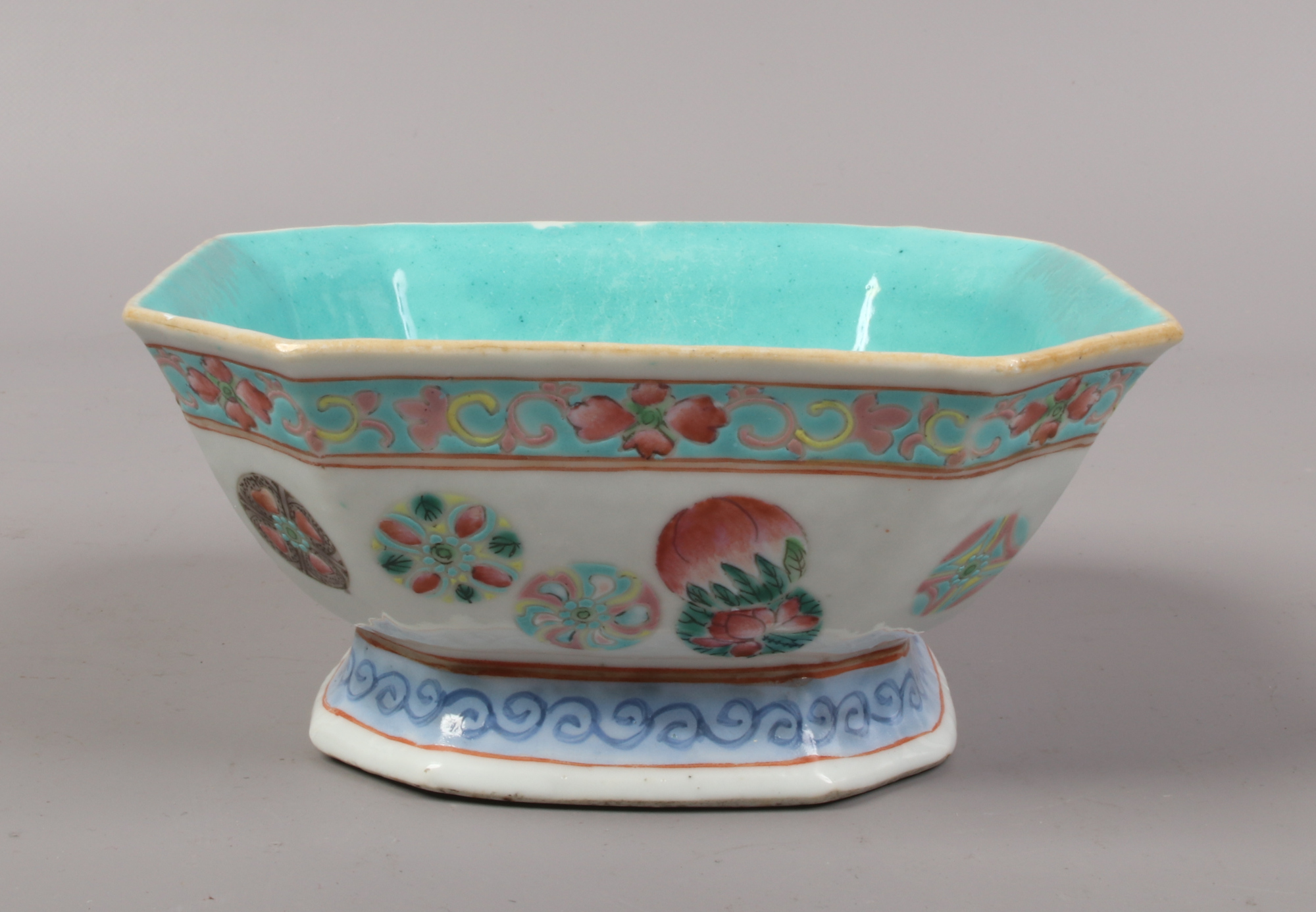 An antique Chinese square cantered bowl decorated in coloured enamels seal mark to the base.