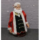 A shop display Santa Claus statue automaton with singing and dancing mechanism.Condition report