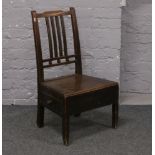 A Georgian mahogany lambing chair.