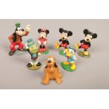 Seven painted lead figures of Disney characters to include Mickey Mouse, Donald Duck, Goofy etc.