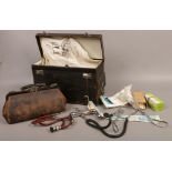 A doctors medicine case and instruments including Neville Barnes forceps and a doctors bag.