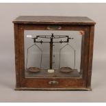 A cased chemical balance scales Fred K Jackson Manchester.