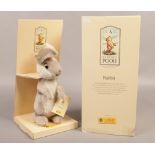 A boxed Steiff classic Pooh rabbit mohair soft toy.