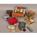 A box of collectables to include silver photo frame, vintage dominoes, Cartier letter and