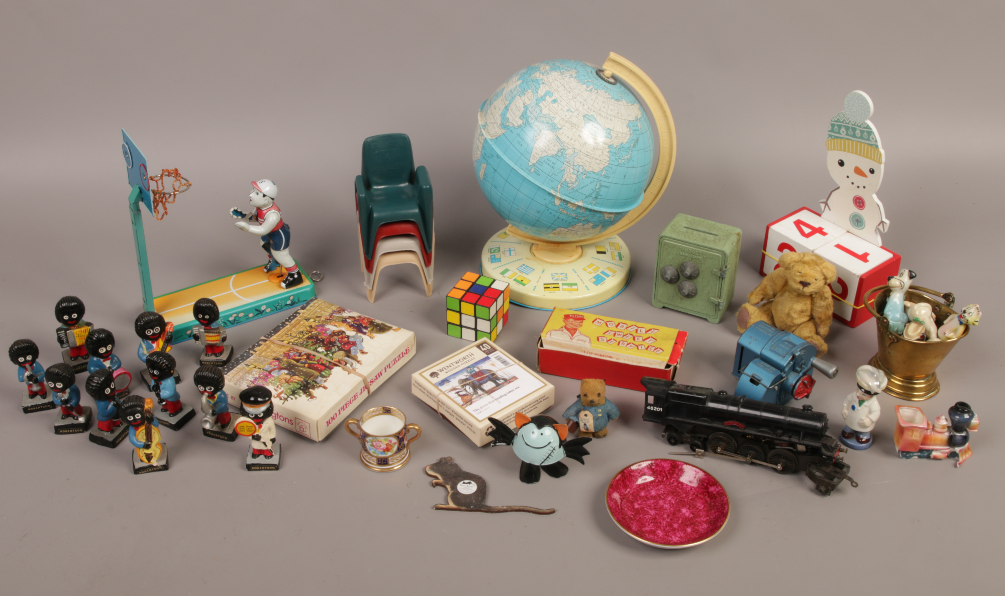 A box of vintage and later toys including Chad Valley tinplate globe, Midget bank safe, Robertsons