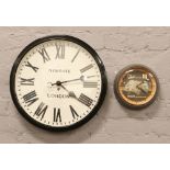 A large reproduction train station style wall clock, dial reads Newgate London, along with a