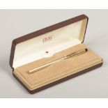 A cased Cross fountain pen in rolled gold body with 14ct gold nib made in Ireland.