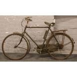 A vintage Raleigh bicycle.Condition report intended as a guide only.In need of restoration.