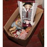 A box of dolls including a boxed example by The Ashton - Drake Galleries.