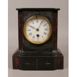 A Victorian slate 30 hour mantle clock with white enamel dial with key.