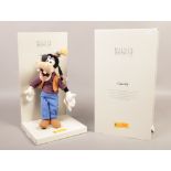 A boxed Steiff Disney showcase collection Goofy mohair soft toy.