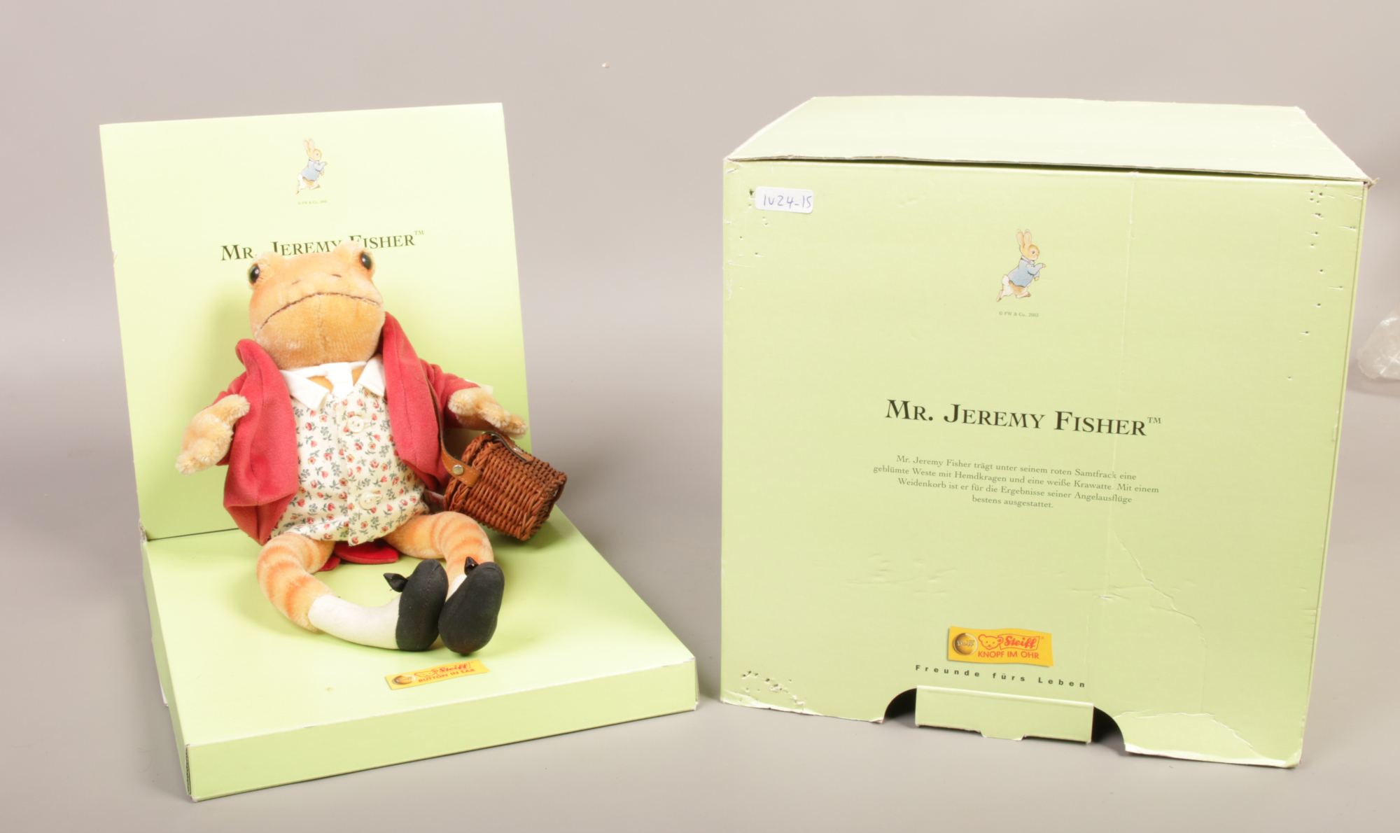 A boxed Steiff mohair Mr Jeremy Fisher soft toy.