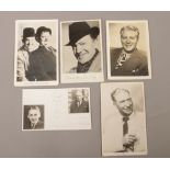 A collection of autographed photographs to include Laurel and Hardy, Tommy Handley, Jack train etc.