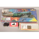 A boxed Hornby Railway Flying Scotsman electric train set along with extra track and Hornby R965