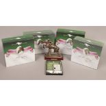 Four boxed bronze effect racehorse model Shergar, Mill Reef, Black Caviar, Secretarial and a unboxed