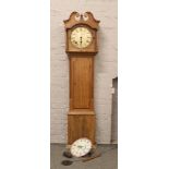 A carved oak Jones & Co. longcase clock for restoration.