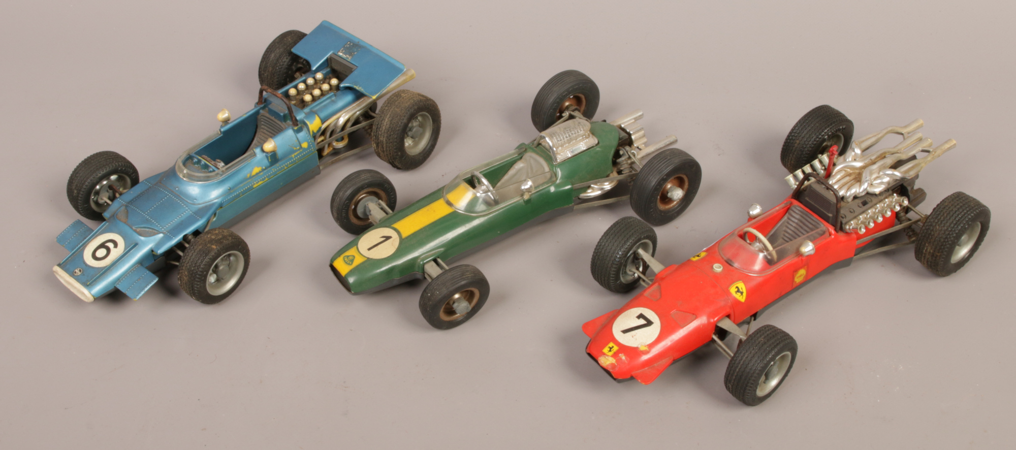 Three Schuco model Formula 1 cars, Matra, Lotus and Ferrari.