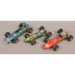 Three Schuco model Formula 1 cars, Matra, Lotus and Ferrari.