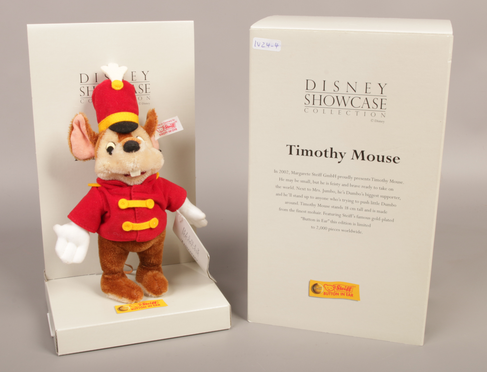 A boxed Steiff Disney showcase collection Timothy Mouse mohair soft toy.