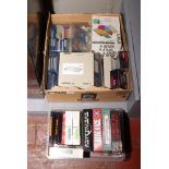 A box of Atari family curriculum discs, along with a box of Atari games.