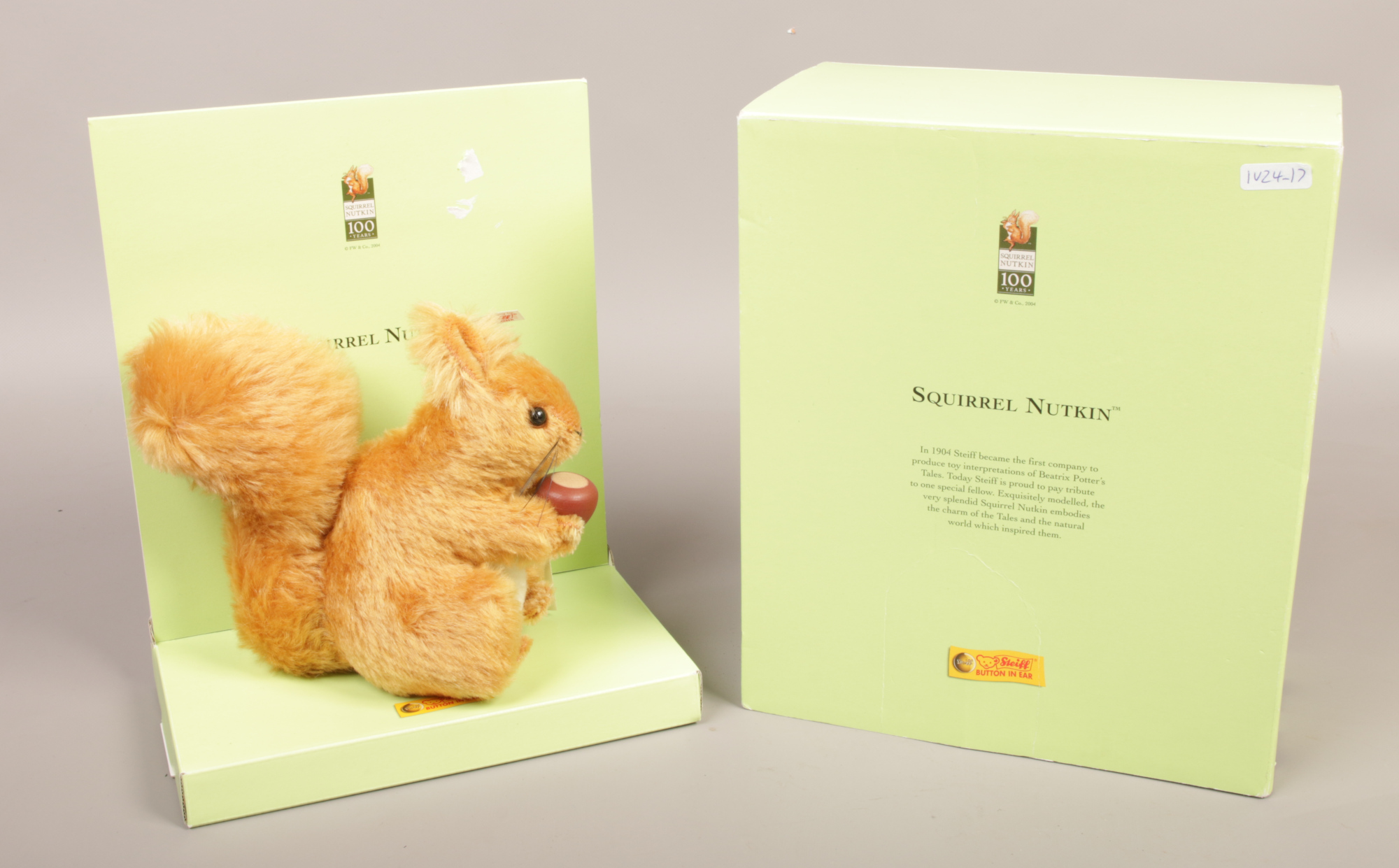 A boxed Steiff mohair Squirrel Nutkin soft toy.