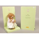 A boxed Steiff mohair Mrs Tiggy Winkle soft toy.