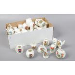 A box of assorted crested china.