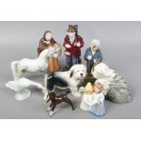 A group of ceramic figures to include John Beswick, Royal Doulton Coalport etc.