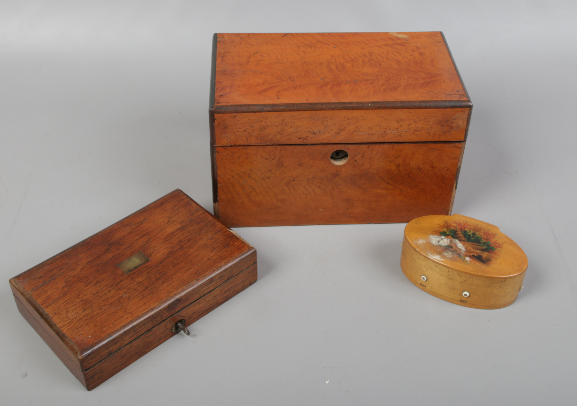 A collection of wooden items including thread dispenser painted with seashells for Clarke & Co.