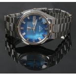 A Seiko stainless steel quartz 3003 bracelet watch. With blue dial, faceted crystal, centre seconds,