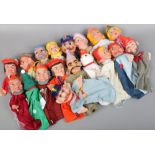 A quantity of continental 1960s hand puppets, approximately 18.