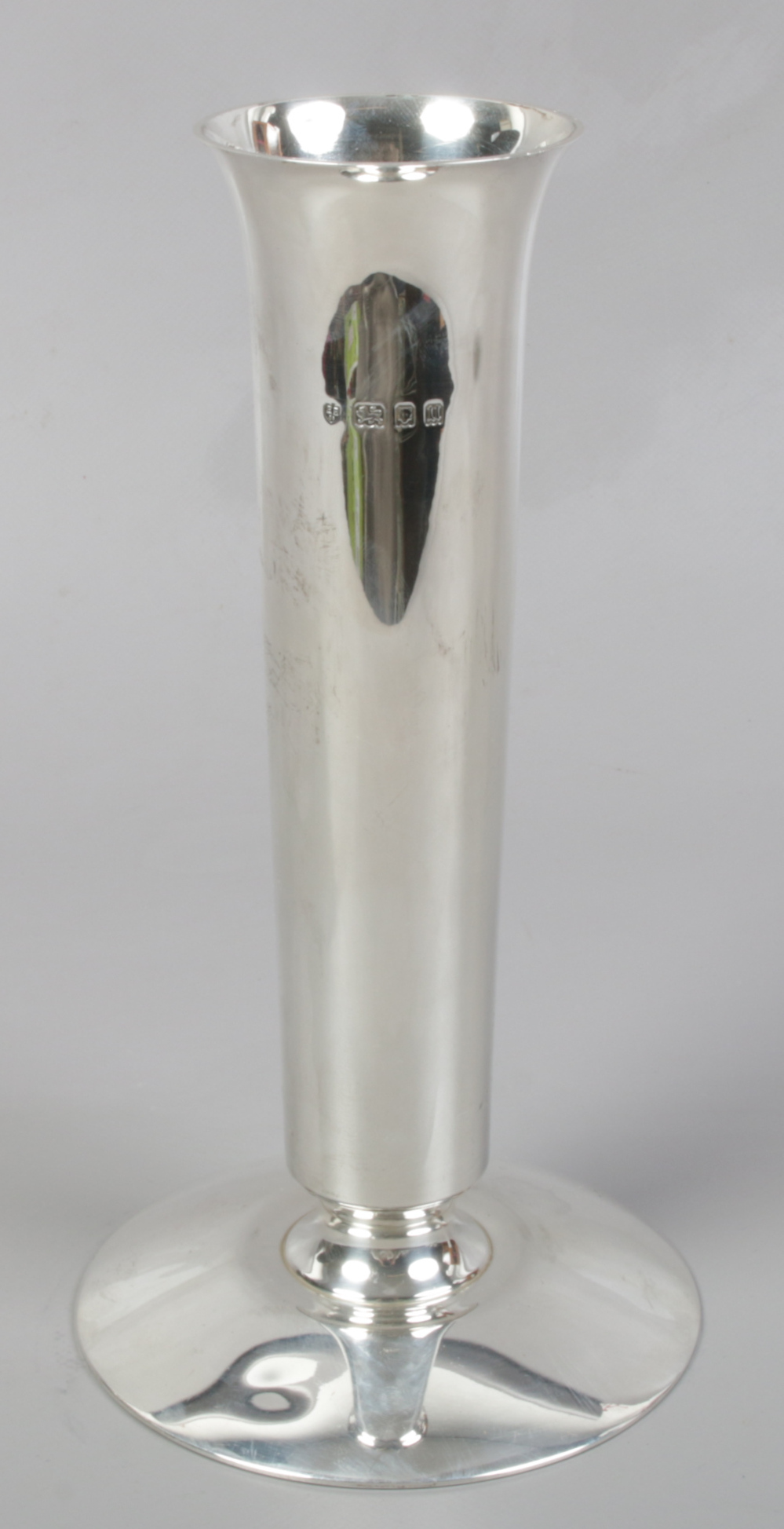 A George V silver cylindrical vase on spreading foot by Edward Barnard & Sons, assayed London