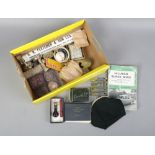 A box of collectables to include French purse, P. Olyslager Motor manuals, razors, silver plate