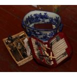 A blue and white pottery footbath (AF) and assortment of silver plated cutlery.