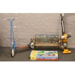 A child's garden bench, vintage Bantel Cat scooter, My First Hornby in box and a child's working