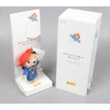 A boxed Steiff mohair Paddington bear ornament.