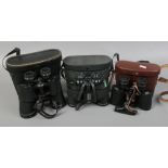 Three pairs of cased binoculars including Greenkat, Carl Zeiss Jena 8 x 30 and Chinon 8 x 40.
