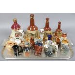A tray of Whisky decanters and alcohol miniatures to include Beneagles animals, Bells Whisky