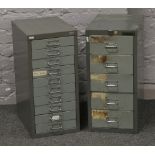 A Bisley steel office five drawer filing cabinet and one similar.