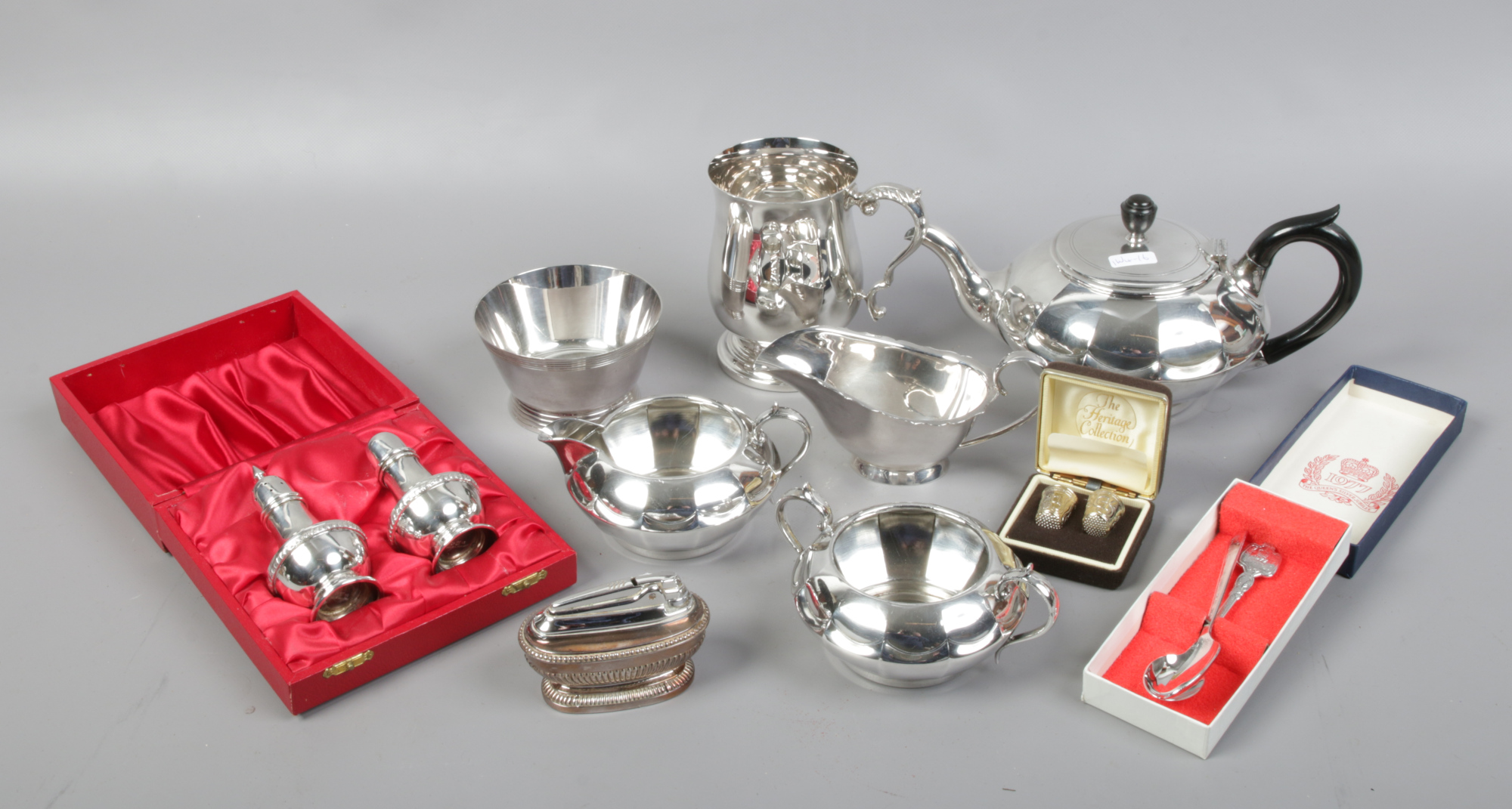 A collection of silver plated wares including James Dixon 3 part tea set, Mappin & Webb, Ronson