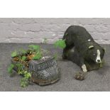 A cast concrete model of a V.W camper van planter along with a cast concrete Sheep Dog, 33cm tall