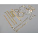 A box of mainly yellow metal costume jewellery bracelets, chains and bangles.