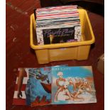 A box of L.P records to include Meatloaf, Bruce Springsteen, Prince etc.