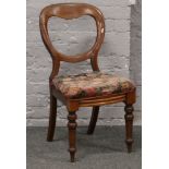 A Victorian ash and elm kitchen armchair, mahogany balloon back chair and a rocking chair for