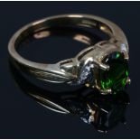 A 9ct gold Russian diopside and diamond ring. With certificate, size N.