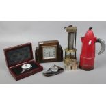 A group of collectables to include miners brass clanny lamp, silver napkin rings, oak mantle clock